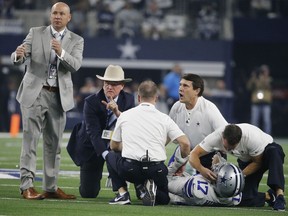 Dallas Cowboys wide receiver Allen Hurns (17) is helped after an injury against the Seattle Seahawks during the first half of the NFC wild-card NFL football game in Arlington, Texas, Saturday, Jan. 5, 2019.