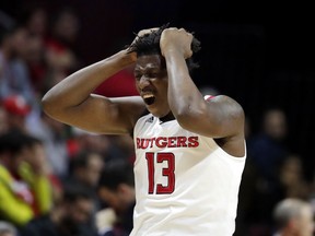 Rutgers forward Shaq Carter reacts after teammate Eugene Omoruyi suffered an injury during the first half of an NCAA college basketball game against Ohio State, Wednesday, Jan. 9, 2019, in Piscataway, N.J.