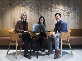Kristy Bates, left, head of sales, Uber Eats Canada, Faye Pang, centre, head of restaurant success, Uber Eats Canada and Dan Park, general manager and head of Uber Eats Canada pose for a photograph at their downtown office space in Toronto on Friday, January 18, 2019.