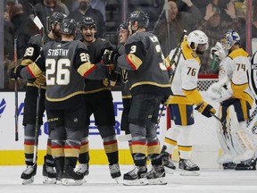 Vegas Golden Knights left wing Max Pacioretty, third from left, celebrates after scoring against thee Nashville Predators during the first period of an NHL hockey game Wednesday, Jan. 23, 2019, in Las Vegas.