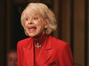 FILE - In this Oct. 18, 2005 file photo, Carol Channing performs during her one woman show,"The First 80 Years are the Hardest," at the cabaret Feinstein's at the Regency in New York.  Channing, whose career spanned decades on Broadway and on television has died at age 97. Publicist B. Harlan Boll says Channing died of natural causes early Tuesday, Jan. 15, 2019 in Rancho Mirage, Calif.