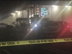 Multiple victims were found with gunshot wounds inside the bowling ally, which is described on its website as a gaming venue that offers bowling, laser tag and a full arcade.  (AP Photo/APTN)