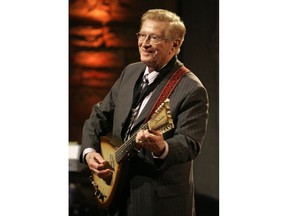 FILE - In this May 6, 2007 file photo, Guitar player Harold Bradley performs at the Country Music Hall of Fame Medallion Ceremony in Nashville, Tenn.  Bradley, who played on hundreds of hit country records and along with his brother, famed producer Owen Bradley, helped craft "The Nashville Sound," has died. He was 93. His daughter Beverly Bradley said he died Thursday, Jan. 31, 2019