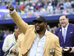 FILE - In this Sept. 23, 2018, file photo, former Baltimore Ravens linebacker Ray Lewis displays his Hall of Fame ring of excellence that he received at a halftime ceremony during an NFL football game between the Ravens and the Denver Broncos, in Baltimore. Lewis is using the celebrity spotlight which will accompany Super Bowl 53 to bring exposure to his Ray of Hope Foundation.  Lewis is throwing a big-ticket party, expected to attract dozens of sports and entertainment stars, to raise money for the foundation.