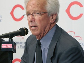 FILE - In this April 2, 2007, file photo, Cincinnati Reds radio broadcaster Marty Brennaman answer questions at a news conference prior to a baseball game against the Chicago Cubs, in Cincinnati. Reds play-by-play broadcaster Marty Brennaman will retire after the 2019 season, his 46th in Cincinnati. The team made the announcement Wednesday, Jan. 16, 2019. The 76-year-old Brennaman joined the Reds' radio team in 1974 and soon became known for his sign-off line after each win: "And this one belongs to the Reds." He and former Reds pitcher Joe Nuxhall shared the booth for 31 seasons from 1974-2004.