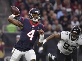 FILE - In this Dec. 30, 2018, file photo, Houston Texans quarterback Deshaun Watson (4) throws a pass against the Jacksonville Jaguars during the first half of an NFL football game in Houston. Watson will make his playoff debut on Saturday against the Indianapolis Colts in his second year in the NFL.