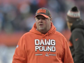 FILE - In this Dec. 9, 2018, file photo, Cleveland Browns offensive coordinator Freddie Kitchens walks on the field after an NFL football game against the Carolina Panthers, in Cleveland. A person familiar with the decision says the Cleveland Browns are hiring Freddie Kitchens as their coach.  Kitchens, who had a dazzling eight-week run as the team's interim offensive coordinator, is finalizing his contract and will be named Cleveland's ninth coach since 1999, said the person who spoke Wednesday, Jan. 9, 2019, to the Associated Press on condition of anonymity because the team is not commenting on the imminent hire.