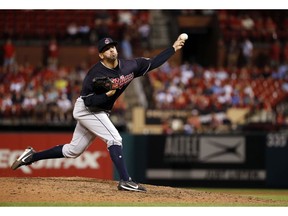 FILE - In this June 27, 2018, fil photo, Cleveland Indians relief pitcher Oliver Perez throws during the eighth inning of a baseball game against the St. Louis Cardinals, in St. Louis. The Indians have re-signed free agent reliever Oliver Perez for next season.