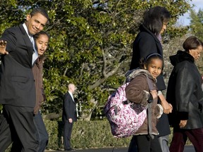 FILE - In this Friday, Feb. 13, 2009 file photo, President Barack Obama and family, depart from the South Lawn of the White House in Washington, for Andrews Air Force Base before heading to Chicago. From left are, the president, his daughter Malia, daughter Sasha, first lady Michelle Obama, and his mother-in-law Marian Robinson. On Friday, Jan. 11, 2018, The Associated Press has found that stories circulating on the internet that Robinson will receive a $160,000 lifetime government pension, are untrue.