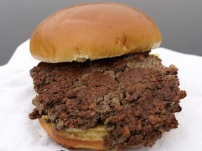 This Friday, Jan. 11, 2019 photo shows a plant-based burger made from wheat protein, coconut oil, potato protein and other ingredients in Bellevue, Neb. Released on Wednesday, Jan. 16, 2019, a report from a panel of nutrition, agriculture and environmental experts recommends a plant-based diet, based on previously published studies that have linked red meat to increased risk of health problems.