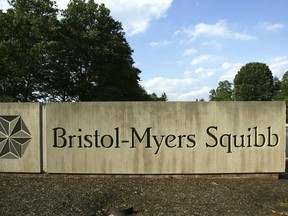 FILE - In this June 15, 2005, file photo, a sign stands in front of a Bristol-Myers Squibb building in a Lawrence Township, N.J. Bristol-Myers Squibb is buying Celgene in a cash-and-stock deal valued at about $74 billion.