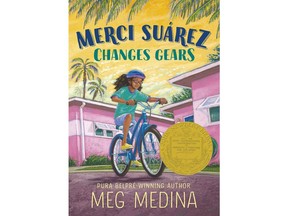 This cover image released by Candlewick Press shows "Merci Suárez Changes Gears," by Meg Medina, which won the John Newbery Medal.  (Candlewick Press via AP)