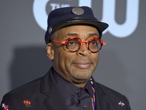 FILE - In this Jan. 13, 2019 file photo, director Spike Lee arrives at the 24th annual Critics' Choice Awards in Santa Monica, Calif. Lee was nominated for an Oscar award for best director for his film, "BlacKkKlansman." The film was also nominated for best picture.