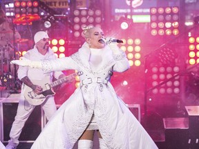 FILE - In this Dec. 31, 2018 file photo, Christina Aguilera performs at the New Year's Eve celebration in Times Square in New York. Aguilera is joining the growing number of musicians launching residencies in Las Vegas. The singer announced Tuesday, Jan. 29, 2019, that "Christina Aguilera: The Xperience" will open at Zappos Theater at Planet Hollywood Resort & Casino on May 31. Aguilera announced 16 performances. Tickets go on sale Saturday.