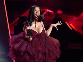 FILE - In this March 11, 2018, file photo, Cardi B accepts the Best New Artist award during the 2018 iHeartRadio Music Awards in Inglewood, Calif. IHeartMedia announced Wednesday that the rapper is nominated for 13 honors at the 2019 iHeartRadio Music Awards. The awards will air live on March 14 from the Microsoft Theater in Los Angeles.