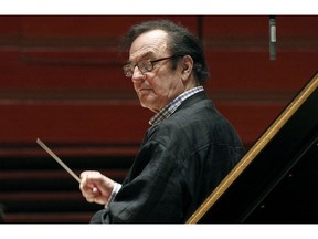 FILE - In this Oct. 19, 2011 file photo, chief conductor Charles Dutoit rehearses with the Philadelphia Orchestra in Philadelphia.   Dutoit, who has faced multiple accusations of sexual assault, will conduct a concert by the National Orchestra of France on Sunday, Feb. 4, 2019. It will be his highest profile performance since the allegations were first revealed.