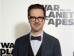 FILE - In this June 19, 2017 file photo, director Matt Reeves appears at the screening of the film "War for the Planet of the Apes" in London.  Warner Bros. announced Wednesday that it will release "The Batman" on June 25, 2021 and "The Suicide Squad" six weeks later on Aug. 6. No casting or story details were released.  Reeves, who directed "Cloverfield" and "Dawn of the Planet of the Apes," will helm the Batman film.