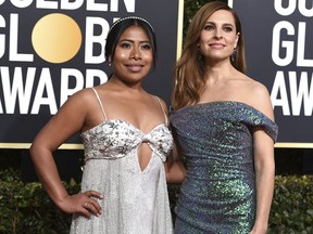 FILE - In this Jan. 6, 2019 file photo, actresses Yalitza Aparicio, left, and Marina de Tavira arrive at the 76th annual Golden Globe Awards in Beverly Hills, Calif. Aparicio and De Tavira portray a domestic worker and her employer, respectively, in the Spanish-language film "Roma."