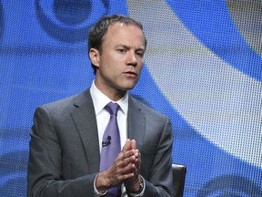 FILE - In this Aug. 10, 2015, file photo, David Rhodes, president of CBS news division, participates in the CBS News panel at the CBS Summer TCA Tour at the Beverly Hilton Hotel in Beverly Hills, Calif. CBS says Rhodes is stepping down following a troubled year that saw morning anchor Charlie Rose and the top executive at "60 Minutes" lose their jobs following misconduct reports and ratings issues at its top shows. In a memo to his staff, Rhodes said Sunday, Jan. 6, 2019, that "the new year is a time for renewal, for new goals. The world we cover is changing, how we cover it is changing - and it's the right time for me to make a change too."