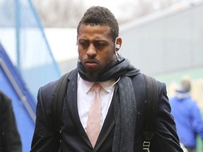 FILE - In this Sunday, Dec. 27, 2015, file photo, Dallas Cowboys defensive end Greg Hardy arrives prior to an NFL football game against the Buffalo Bills, in Orchard Park, N.Y. Former NFL defensive end Greg Hardy says he is "haunted" by his high-profile domestic violence past and wants to prove he has changed as he makes his debut in UFC, a promotion that hasn't hesitated to embrace fighters with legal or drug problems.