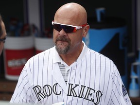 File-This June 23, 2018, file photo shows retired Colorado Rockies outfielder Larry Walker during picture day for the Rockies before a baseball game in Denver. Walker made a significant leap in Hall of Fame voting only to fall short in his ninth year on the ballot. The longtime player for the Montreal Expos, Colorado Rockies and St. Louis Cardinals finished with 54.6 percent. That was up more than 20 percent from a year ago. He thinks analytics may have boosted his case.