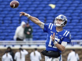 File-This Nov. 24, 2018 file photo shows Duke Quarterback Daniel Jones making a pass during the second half of an NCAA college football game in Durham, N.C. NFL scouts, coaches and prospects have gathered in Mobile, Alabama, for the Senior Bowl. The game for top senior NFL prospects and junior graduates will feature quarterbacks like Missouri's Drew Lock, West Virginia's Will Grier and Duke's Jones.