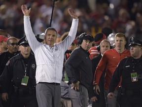 Ohio State coach Urban Meyer celebrates the team's 28-23 win over Washington during the Rose Bowl NCAA college football game Tuesday, Jan. 1, 2019, in Pasadena, Calif.