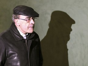 Cardinal Philippe Barbarin, 68, arrives at the Lyon courthouse to attend his trial, in Lyon, central France, Monday Jan. 7, 2019. The Roman Catholic Church faces another public reckoning when a French cardinal, Philippe Barbarin, goes on trial Monday for his alleged failure to report a pedophile priest who confessed to preying on Boy Scouts and whose victims want to hold one of France's highest church figures accountable.