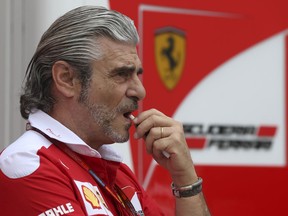 FILE - In this June 19, 2016 file photo, Ferrari team principal Maurizio Arrivabene grimaces prior to the start of the Formula One Grand Prix of Europe at the Baku circuit, in Baku, Azerbaijan. Ferrari has replaced Maurizio Arrivabene with Mattia Binotto as team principal following another failed Formula One title chase. Binotto had been working as Ferrari's chief technical officer, having been with the team for nearly 25 years. Ferrari says in a statement, "After four years of untiring commitment and dedication, Maurizio Arrivabene is leaving the team. The decision was taken together with the company's top management after lengthy discussions related to Maurizio's long term personal interests as well as those of the team itself."