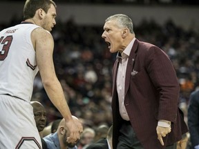 South Carolina head coach Frank Martin shouts at forward Felipe Haase (13) during the first half of an NCAA college basketball game against Auburn Tuesday, Jan. 22, 2019, in Columbia, S.C.