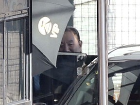 Kim Yong Chol, a North Korean senior ruling party official and former intelligence chief, gets into a car upon his arrival at the Beijing International airport in Beijing Thursday, Jan. 17, 2019.