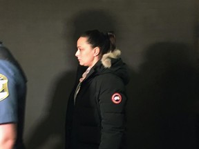 Virginia Genevrier, 40, leaves court after being sentenced in Montreal on Thursday, January 17, 2019.