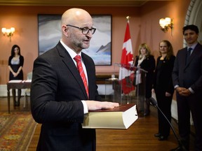 David Lametti is sworn in as Justice Minister and Attorney General of Canada at a swearing in ceremony at Rideau Hall in Ottawa on Jan. 14, 2019.