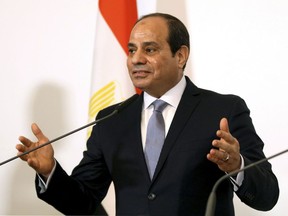 FILE - In this Dec. 17, 2018, file photo, Egyptian President Abdel-Fattah el-Sissi addresses the media during a joint press conference at the federal chancellery in Vienna, Austria. U.S. television network CBS says el-Sissi told it in an interview that his country and Israel, with whom it fought four wars, are cooperating against Islamic militants in the Sinai Peninsula.