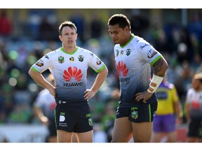 In this Aug. 12, 2018, photo, Canberra Raiders' Sam Williams, left, and Joey Leilua react during a Round 22 NRL rugby match between the Canberra Raiders and the Wests Tigers at GIO Stadium in Canberra, Australia. An Australian football team says it wants to continue Huawei's longest-ever sports sponsorship despite the Chinese communication giant's legal wrangle with the United States and its ban from Australia's 5G networks. Huawei has been the major sponsor of the Raiders since 2012 and will consider this year extending its first sponsorship contract with a sports team anywhere in the world.