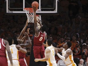 Alabama forward Donta Hall (0) tips the ball in against Tennessee in the first half of an NCAA college basketball game Saturday, Jan. 19, 2019, in Knoxville, Tenn.