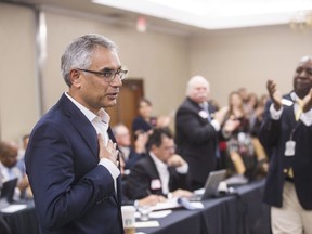 FILE - In this Dec. 1, 2018, file photo, Dr. Shahid Shafi, speaks before members of the State Republican Executive Committee, following a vote in favor of resolution that opposes an effort by the Tarrant County Republican Party (TCRP) to remove him as vice chair because of his religion, during the committee's quarterly meeting on Saturday, Dec. 1, 2018, in Austin.
