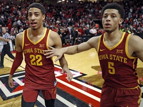 Iowa State's Tyrese Haliburton (22) and Lindell Wigginton (5) celebrate after the team's NCAA college basketball game against Texas Tech, Wednesday, Jan. 16, 2019, in Lubbock, Texas.