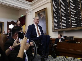 Gov. Greg Abbott arrives to address the House members during the first day of the 86th Texas Legislative session, Tuesday, Jan. 8, 2019, in Austin, Texas.