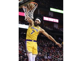 Los Angeles Lakers center JaVale McGee dunks against the Houston Rockets during the first half of an NBA basketball game Saturday, Jan. 19, 2019, in Houston.