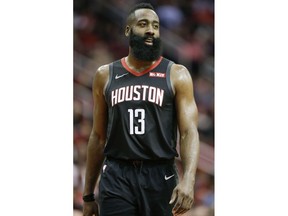Houston Rockets guard James Harden walks on the court during a timeout during the second half of the team's NBA basketball game against the Cleveland Cavaliers, Friday, Jan. 11, 2019, in Houston.