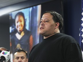 FILE - In this Monday, Dec. 31, 2018 file photo, Christopher Cevilla, father of 7-year-old Jazmine Barnes, speaks during a news conference, in Houston. Authorities in Texas say on Saturday, Jan. 5, 2019, "persons of interest" are being interviewed in the investigation into the shooting death of the young black girl. Jazmine's family has said they believe the shooting was racially motivated.