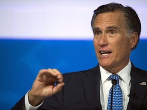 File-This Oct. 9, 2018, file photo shows Republican U.S. Senate candidate Mitt Romney answering a question about tariffs during the debate with Democratic opponent Jenny Wilson in the America First Event Center in Cedar City, Utah. Utah Sen.-elect Romney says President Donald Trump's "conduct over the past two years ... is evidence that the president has not risen to the mantle of the office." Romney, who was the Republican presidential nominee in 2012, is praising some of Trump's policy decisions in a Washington Post op-ed published Tuesday, Jan. 1, 2019. But he adds: "With the nation so divided, resentful and angry, presidential leadership in qualities of character is indispensable. And it is in this province where the incumbent's shortfall has been most glaring."