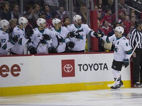 San Jose Sharks center Joe Pavelski (8) celebrates his goal with his teammates in the first period of an NHL hockey game Washington Capitals, Tuesday, Jan. 22, 2019, in Washington.