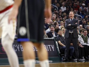 Milwaukee Bucks coach Mike Budenholzer watches from the sideline during the first half of an NBA basketball game against the Atlanta Hawks on Friday, Jan. 4, 2019, in Milwaukee.