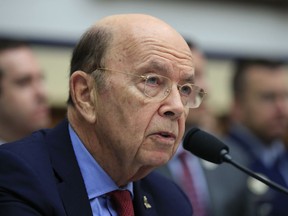 FILE - In this June 22, 2018, file photo, Commerce Secretary Wilbur Ross, testifies on Capitol Hill in Washington. Ross, one of the richest people in President Donald Trump's Cabinet, is questioning why furloughed federal workers are reluctant to take out loans to get through the government shutdown.