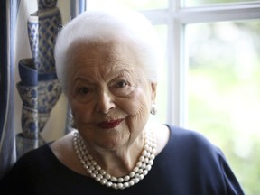 FILE - In this June 18, 2016, file photo, U.S. actress Olivia de Havilland poses during an Associated Press interview, in Paris. The Supreme Court is declining to revive a lawsuit by Olivia de Havilland over the FX Networks miniseries "Feud: Bette and Joan." The high court on Monday, Jan. 7, 2019, said it would not take the 102-year-old actress's case