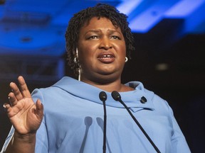 FILE - In this Nov. 6, 2018 file photo, Georgia Democratic gubernatorial candidate Stacey Abrams addresses supporters during an election night watch party in Atlanta. Senate Democratic Leader Charles Schumer says Abrams will deliver the Democratic response to President Donald Trump's State of the Union address.