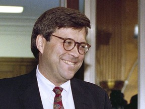 FILE - In this Nov. 12, 1991 file photo, then Attorney General nominee William Barr is shown on Capitol Hill in Washington. Barr once advised the U.S. government that it could attack Iraq without Congressional approval, arrest a deposed foreign dictator and capture suspects abroad without that country's permission. Those decisions reflect a broad view of presidential power that Barr, President Donald Trump's pick to reclaim his old attorney general job, demonstrated at the Justice Department and in the years since.