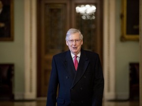 In this Jan. 3, 2019, photo, Senate Majority Leader Mitch McConnell of Ky. arrives on Capitol Hill in Washington, as the 116th Congress begins. Senate Republicans' first bill of the new Congress aims to insert the legislative branch into President Donald Trump's Middle East policy -- but also tries to drive a wedge between centrist and liberal Democrats over attitudes toward Israel. The bipartisan package backed by McConnell, had initially drawn widespread support ahead of Tuesday's vote.